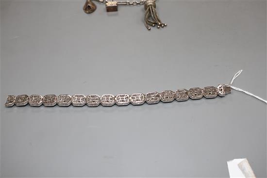 A modern 14k white metal and diamond encrusted octagonal link bracelet, 18.3cm, gross weight, 35.8 grams.